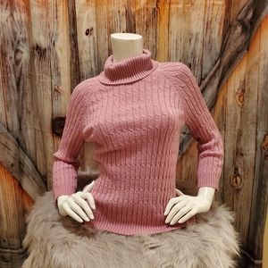 Knitted pink sweater with small turtleneck